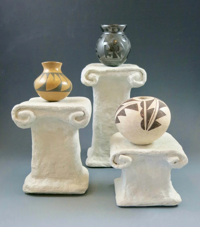 Learn to make your own art display pedestals with this project tutorial!  These DIY pedestals made with wood and CelluClay instant paper mache will add a sophisticated touch to any art project display!